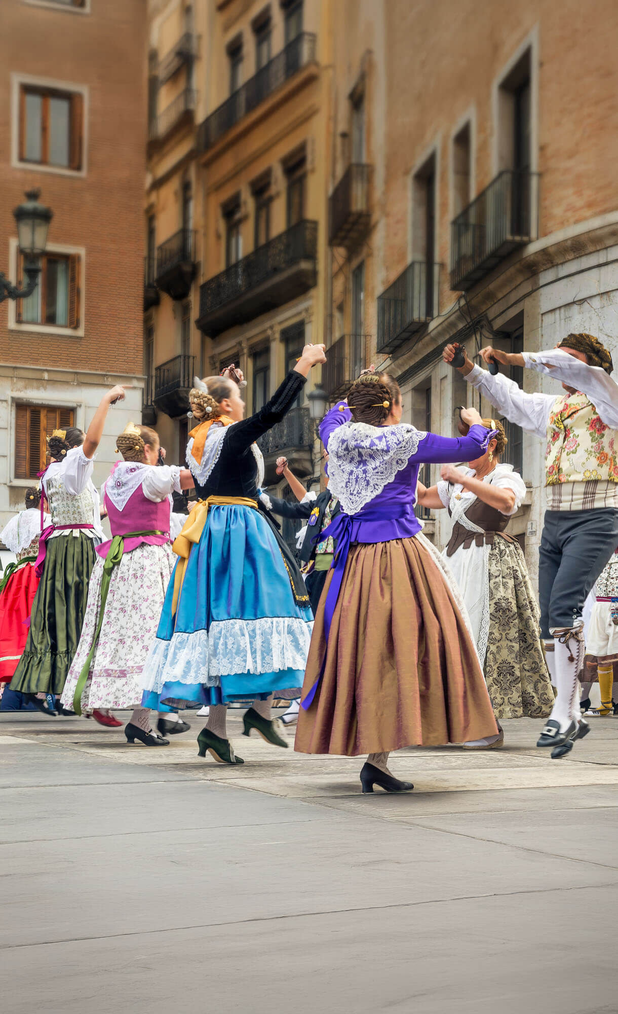 Traditional dressed dancers in a street in Spain