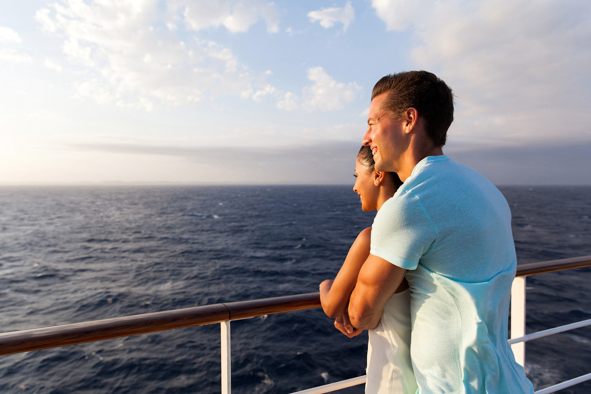 Couple on deck at sea (AdobeStock 74444221)